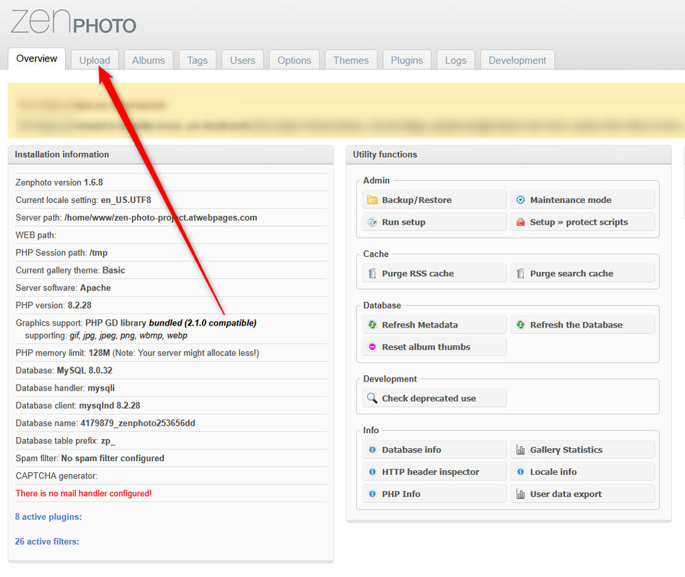 Navigate to the Upload tab in Zenphoto admin panel